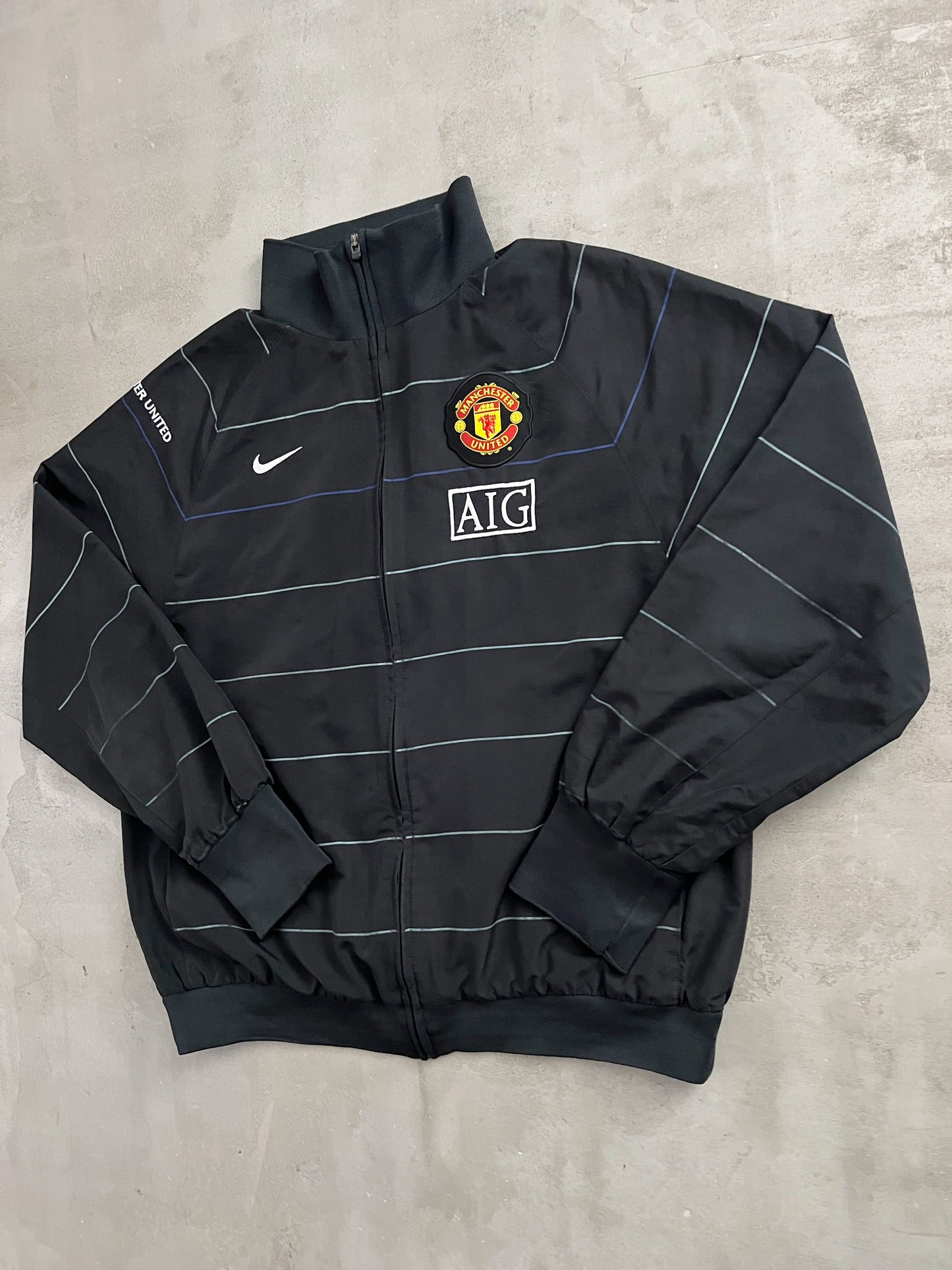 BLACK MANCHESTER UNITED NIKE JACKET - 2000S - L
