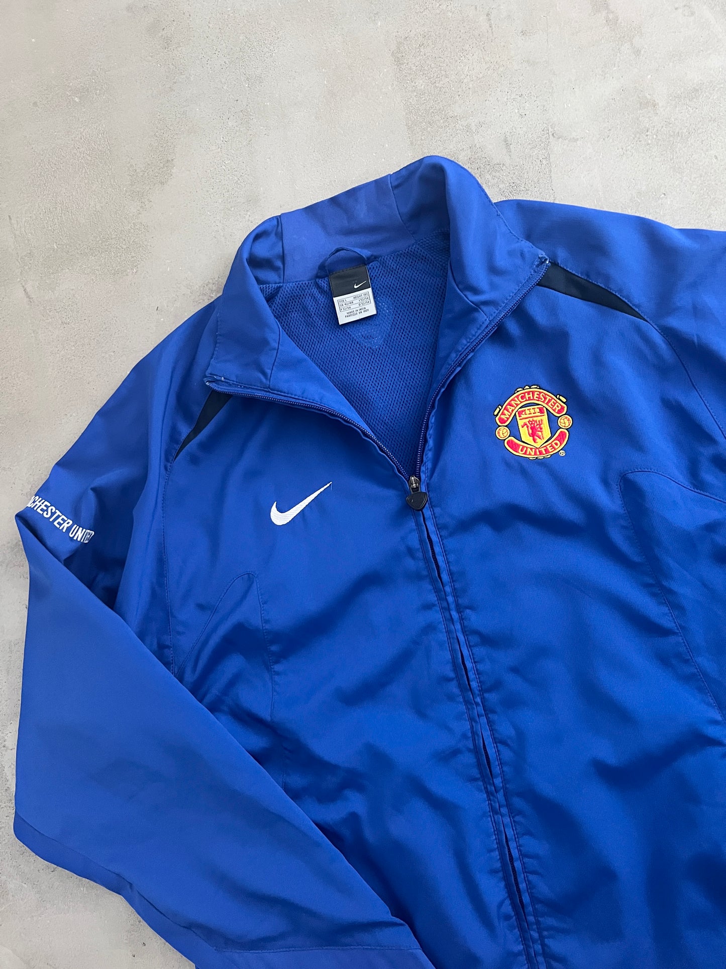 BLUE MANCHESTER UNITED NIKE JACKET - 2000S - L