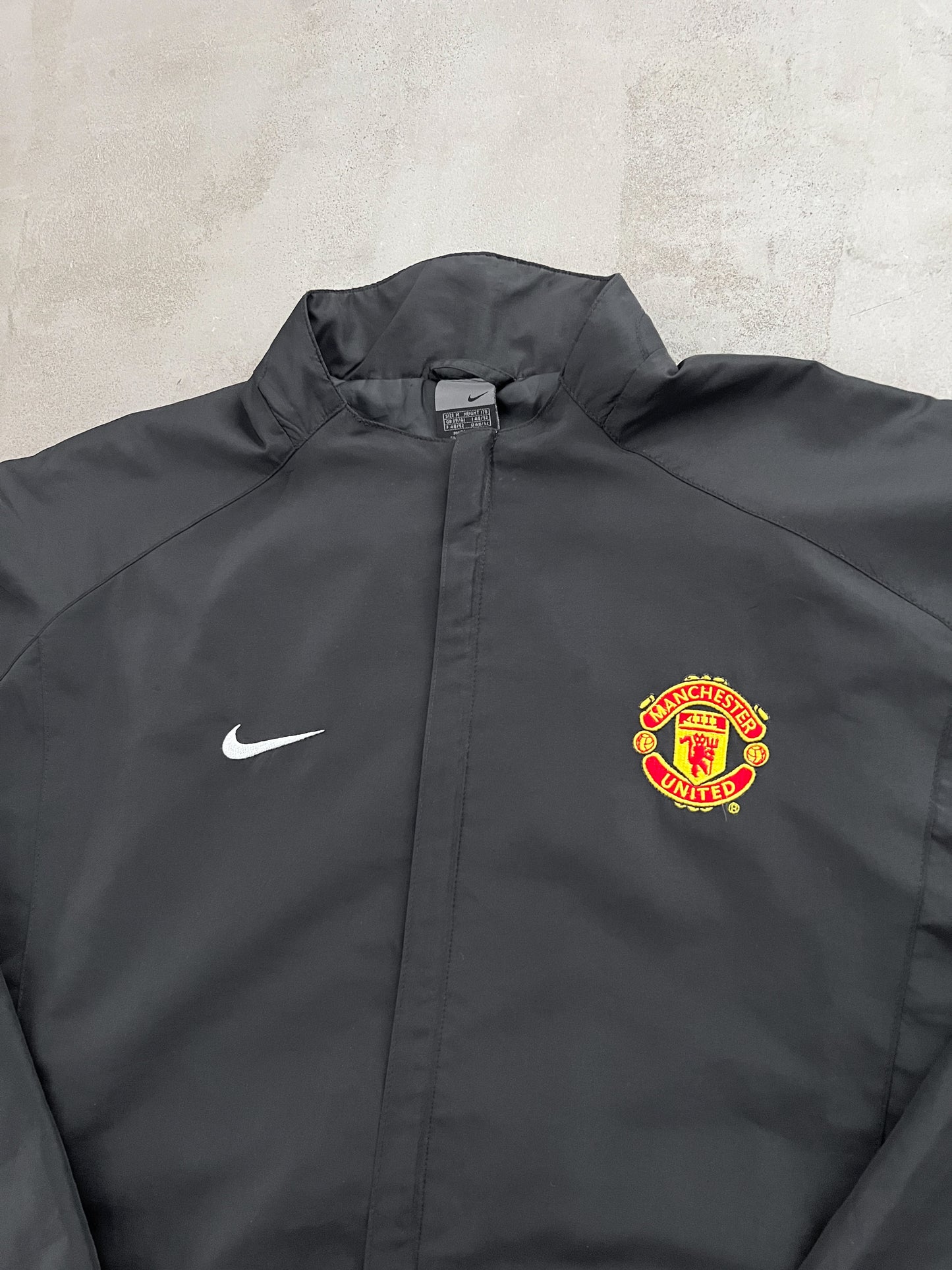 BLACK MANCHESTER UNITED NIKE JACKET - 2000S - L