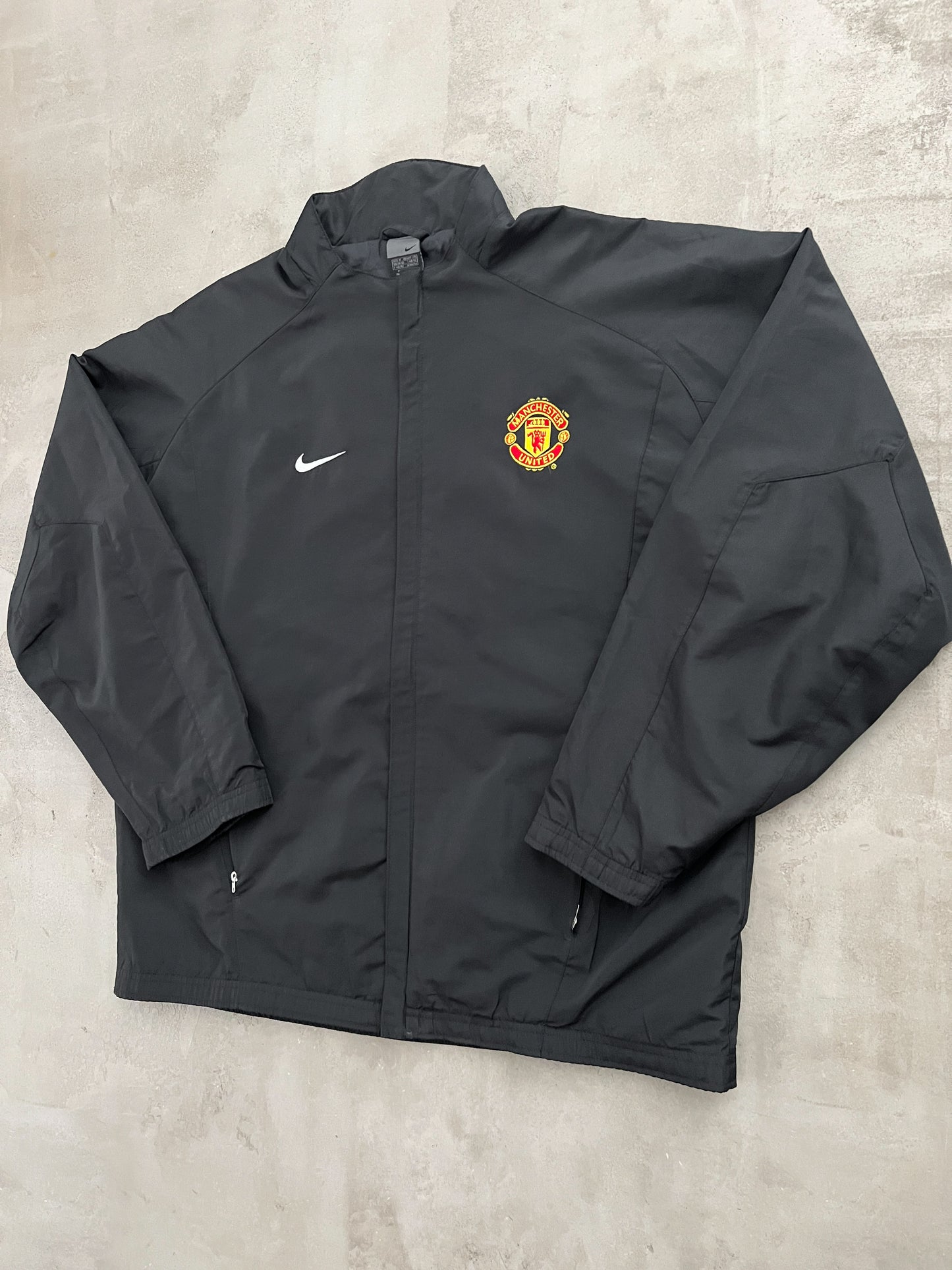BLACK MANCHESTER UNITED NIKE JACKET - 2000S - L