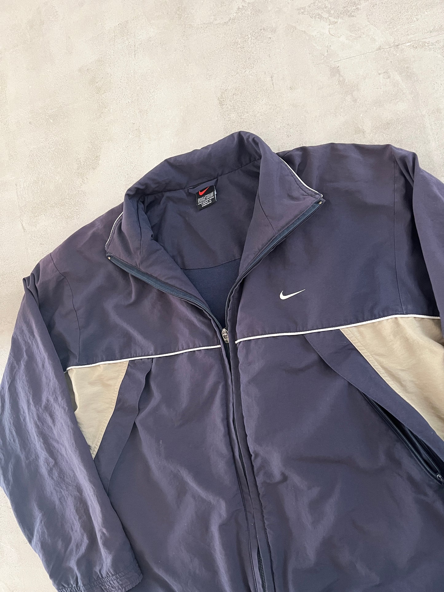 FADED NAVY NIKE TRACK JACKET - 1990S - S/M