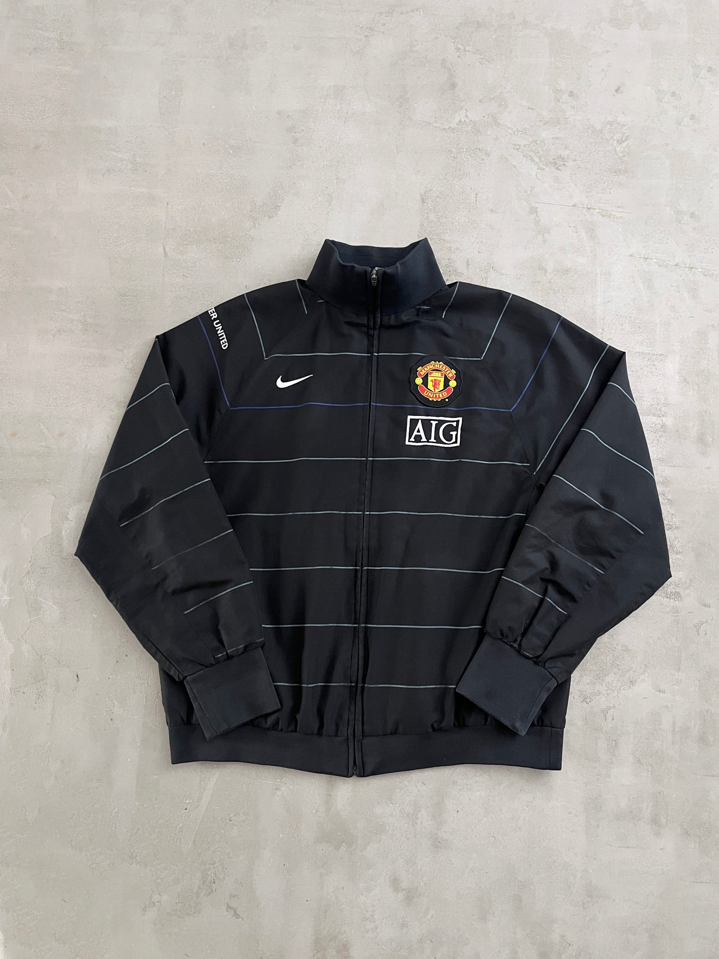 BLACK MANCHESTER UNITED NIKE JACKET - 2000S - L