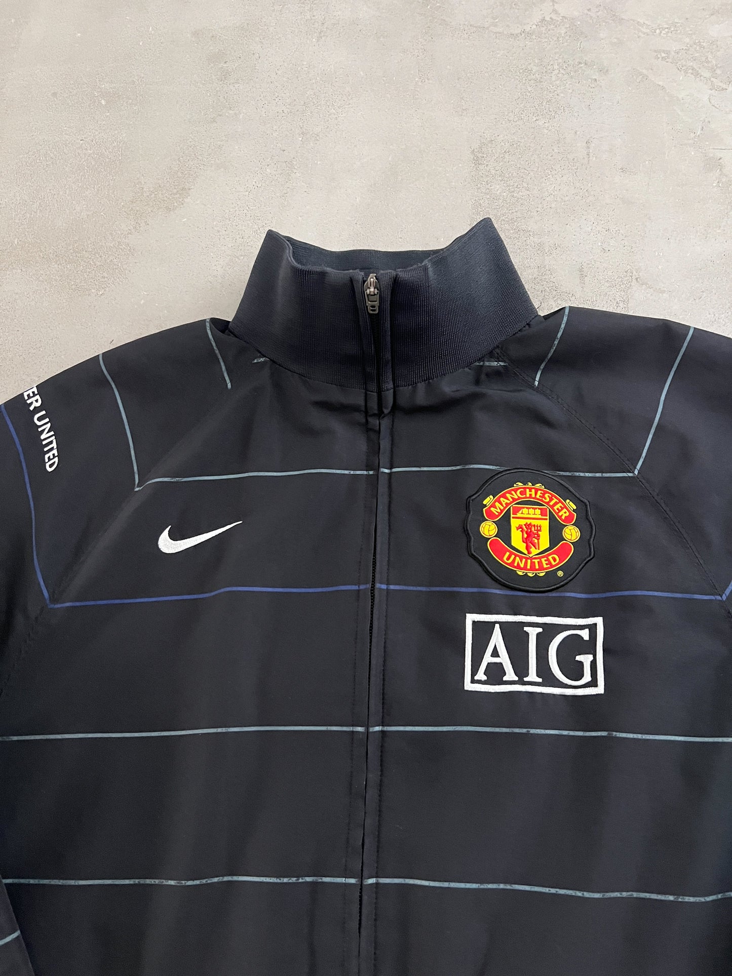 BLACK MANCHESTER UNITED NIKE JACKET - 2000S - L