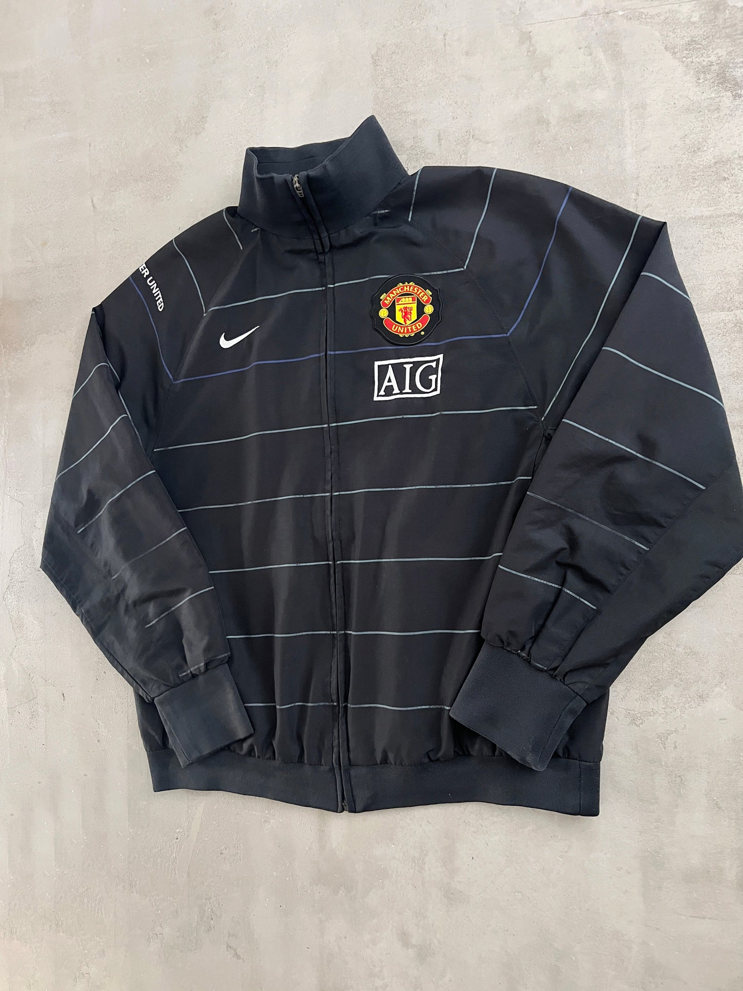 BLACK MANCHESTER UNITED NIKE JACKET - 2000S - L