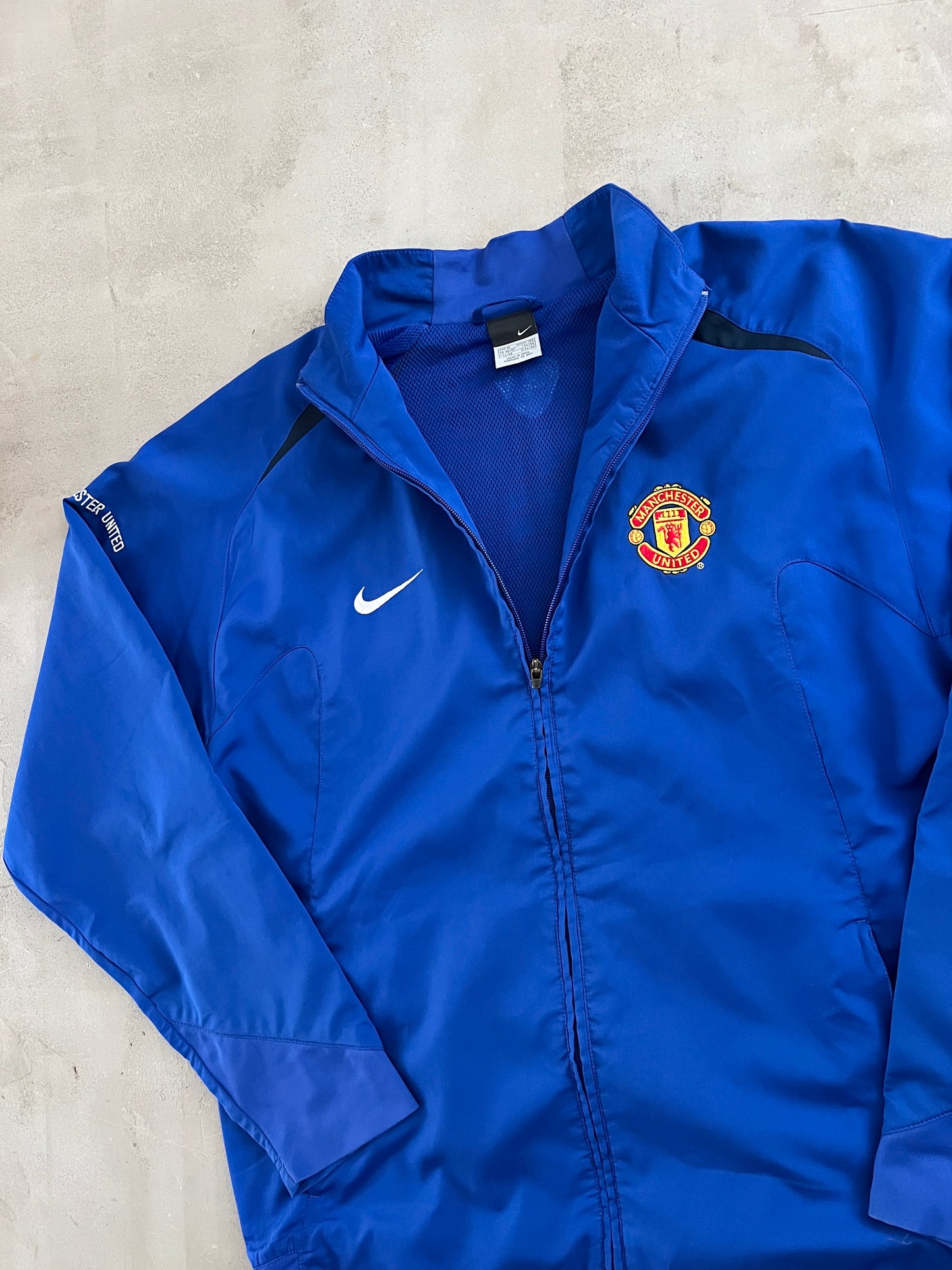 BLUE MANCHESTER UNITED NIKE JACKET - 2000S - XL
