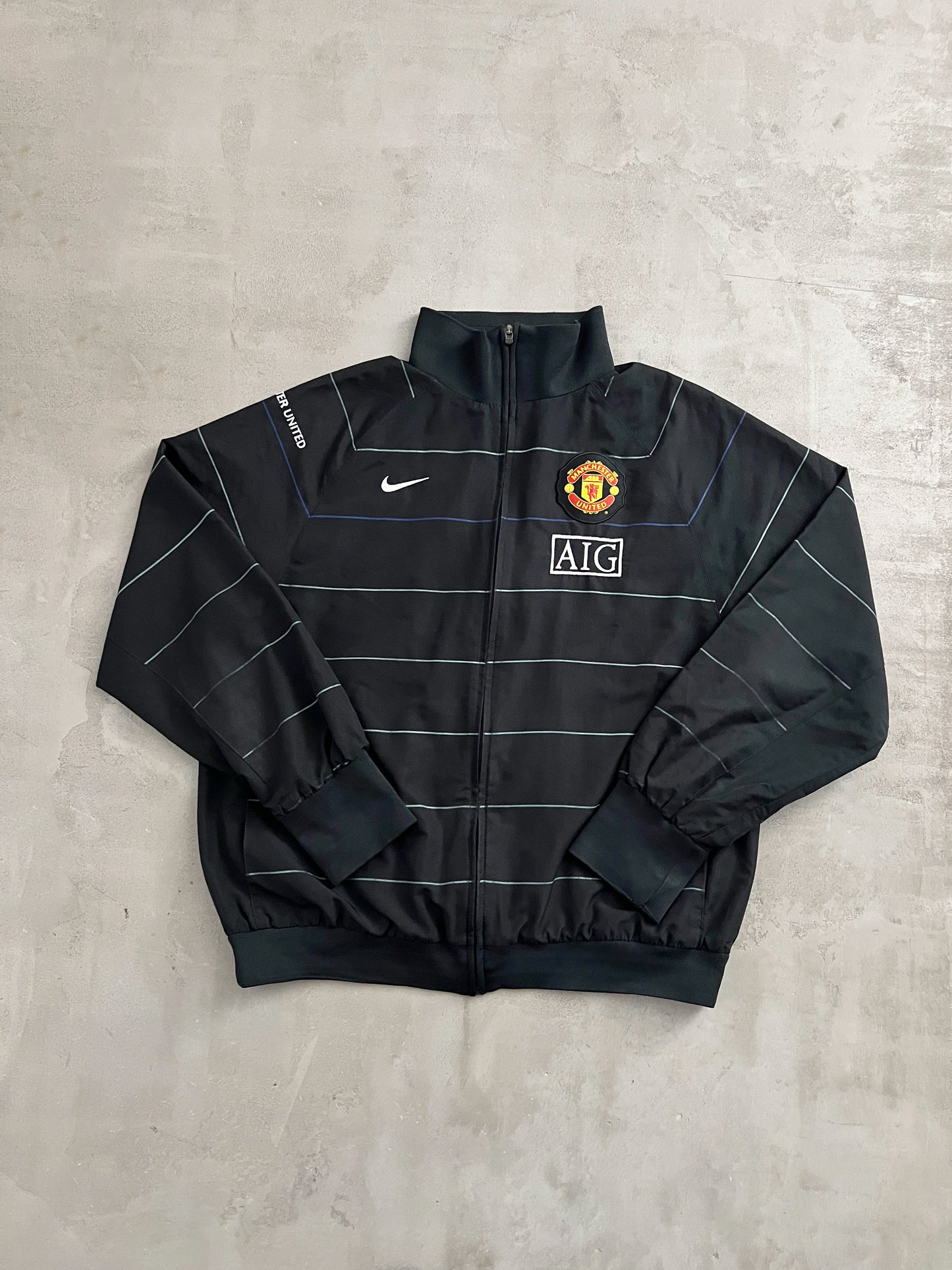 BLACK MANCHESTER UNITED NIKE JACKET - 2000S - L
