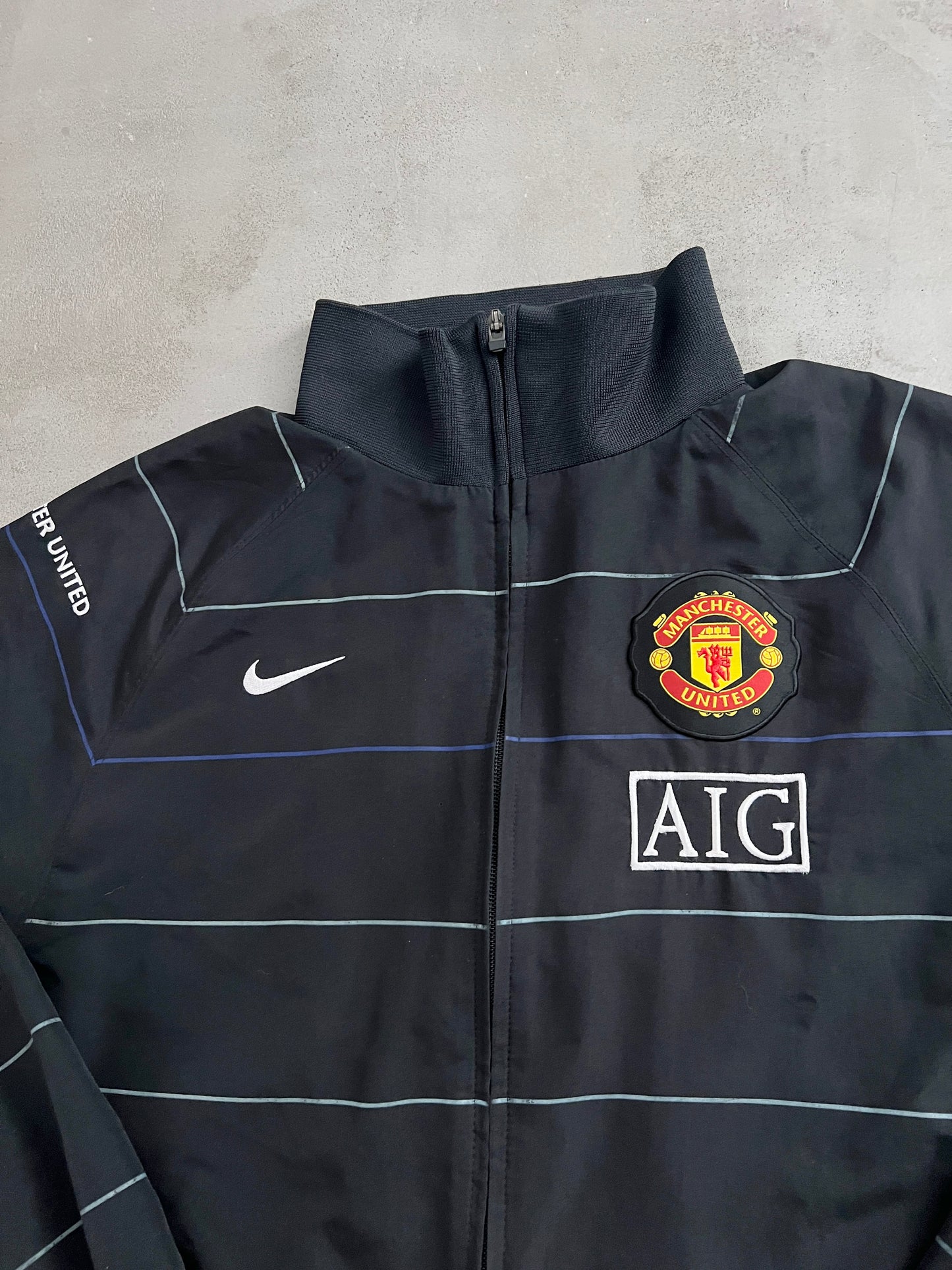 BLACK MANCHESTER UNITED NIKE JACKET - 2000S - L