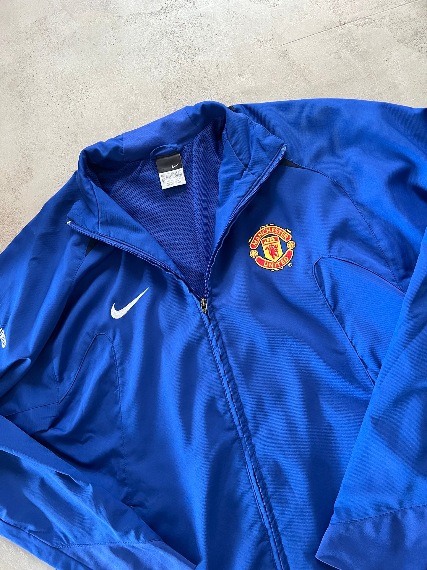 BLUE MANCHESTER UNITED NIKE JACKET - 2000S - L