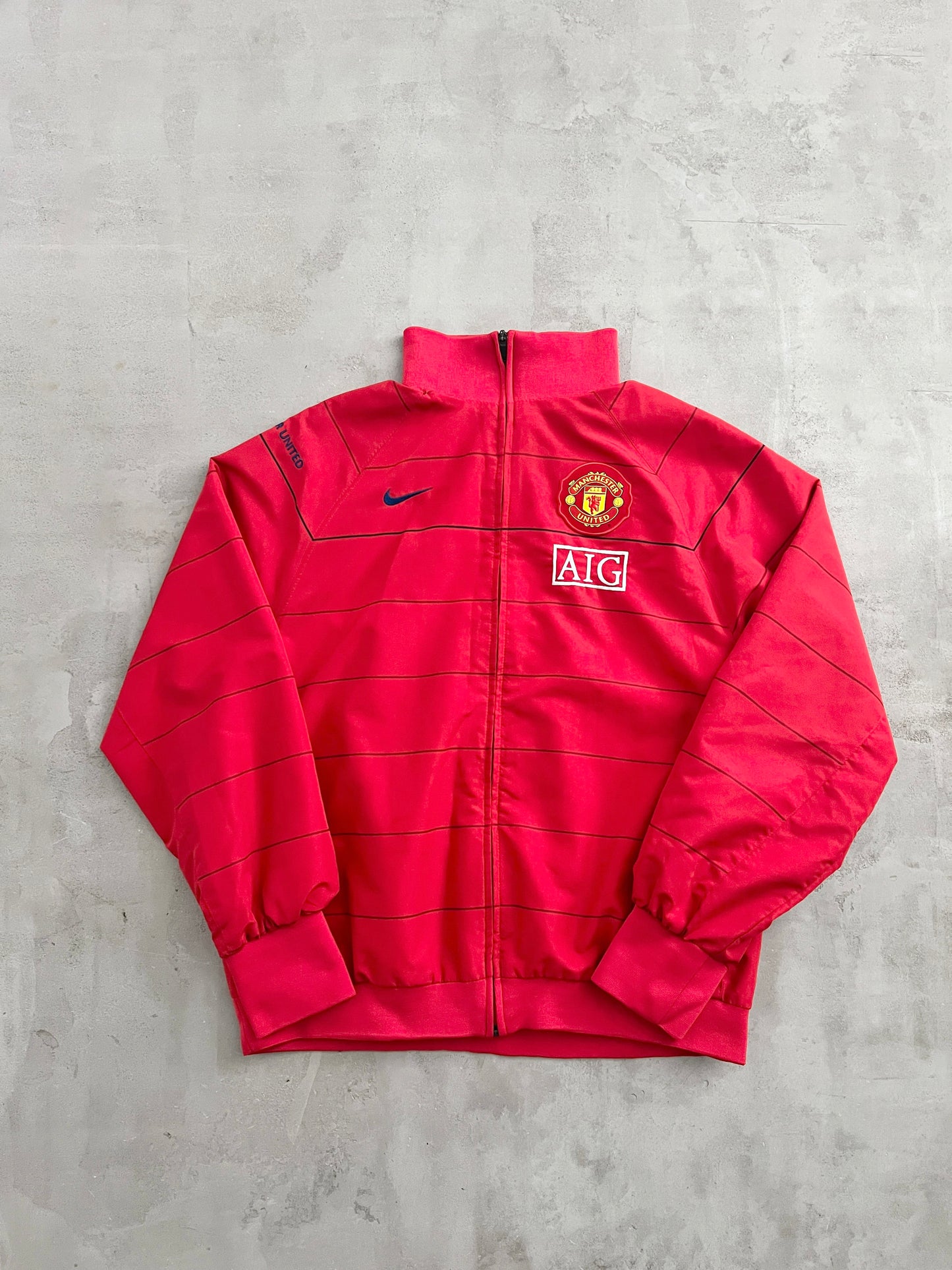 RED MANCHESTER UNITED NIKE JACKET - 2000S - L