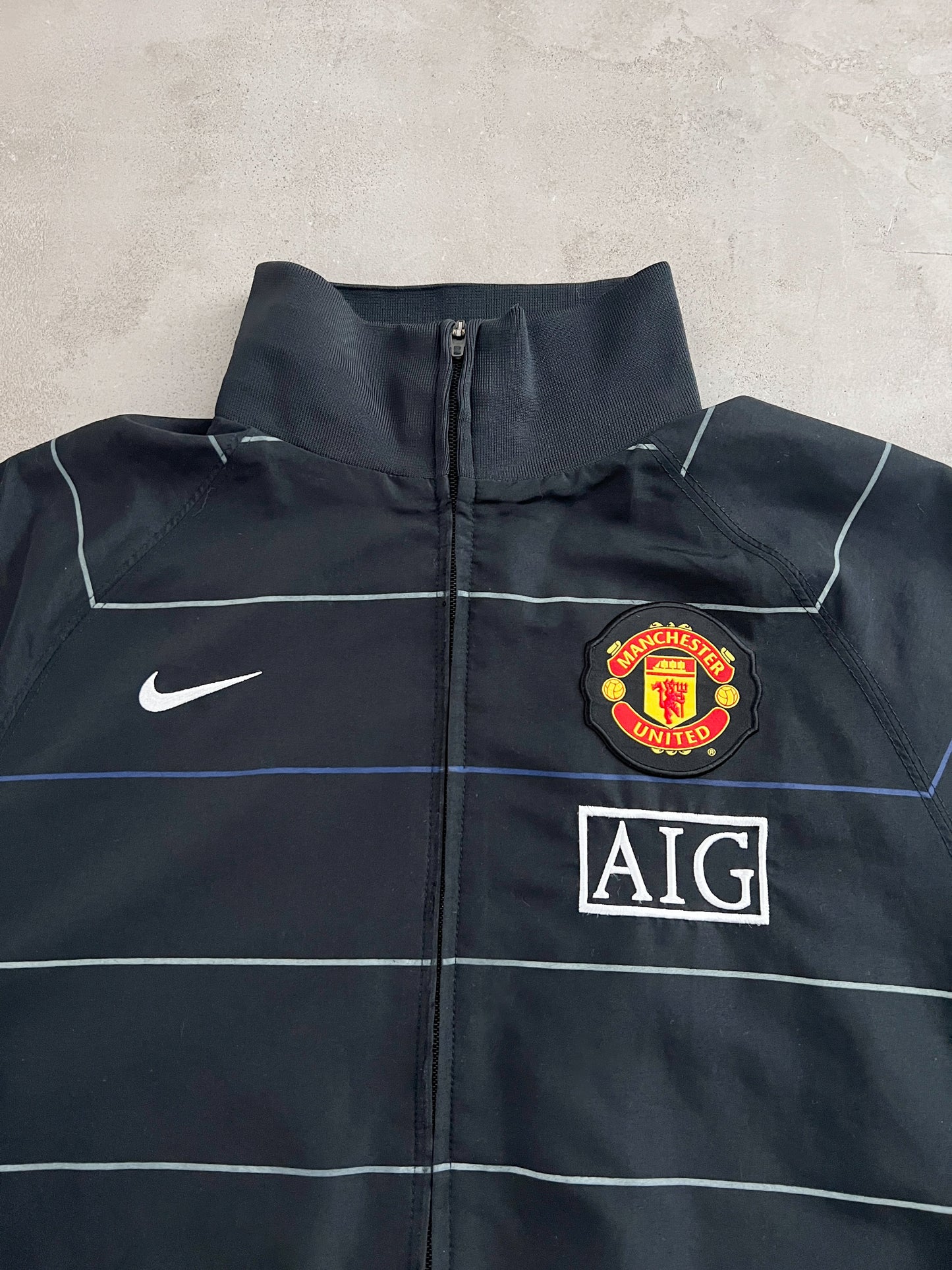BLACK MANCHESTER UNITED NIKE JACKET - 2000S - L