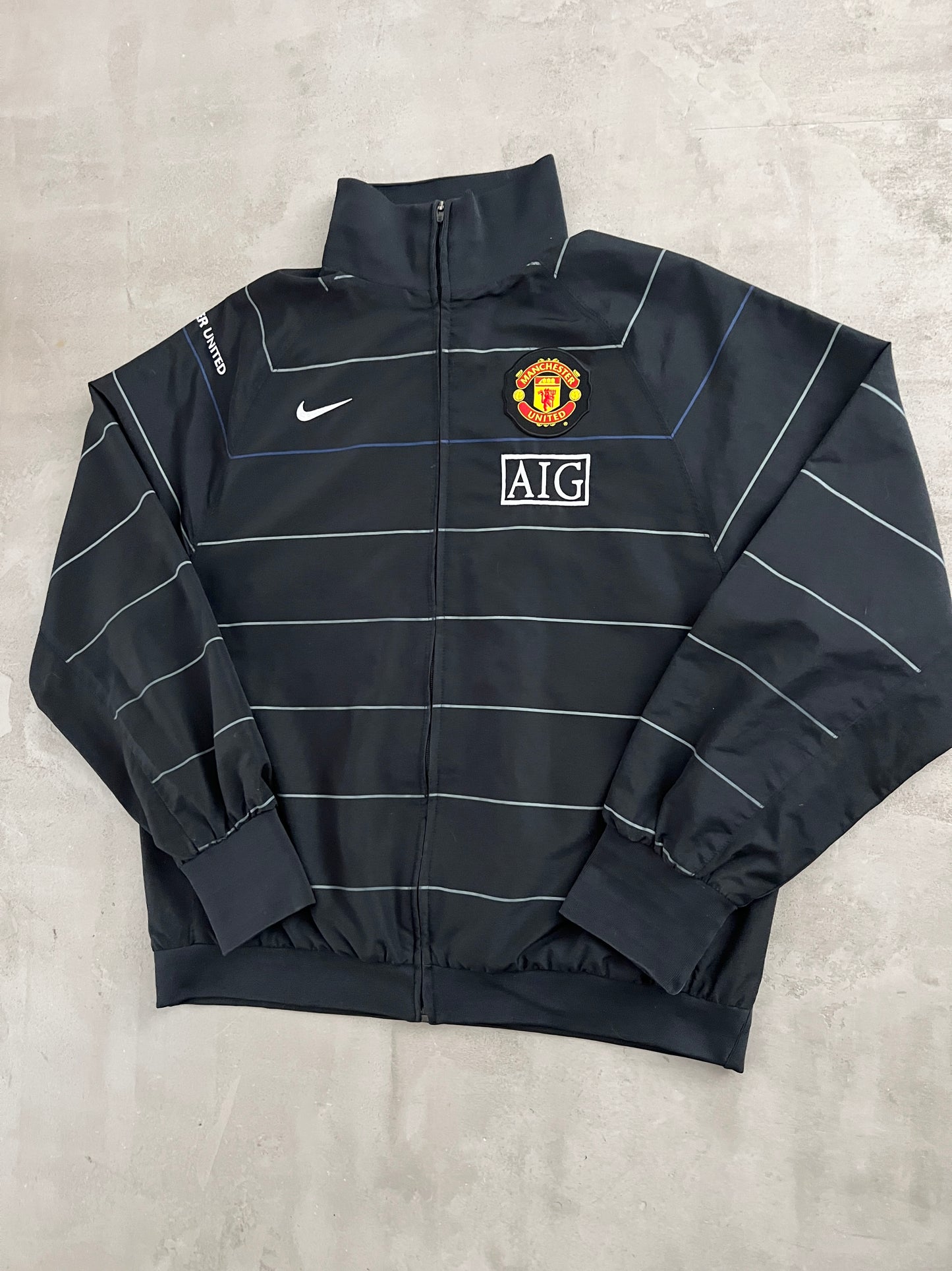 BLACK MANCHESTER UNITED NIKE JACKET - 2000S - L