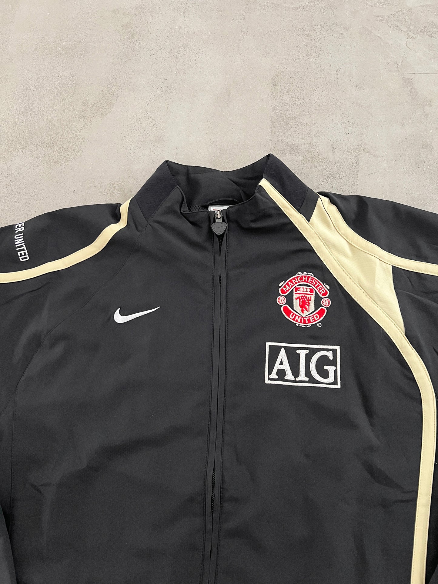 BLACK MANCHESTER UNITED NIKE JACKET - 2000S - L