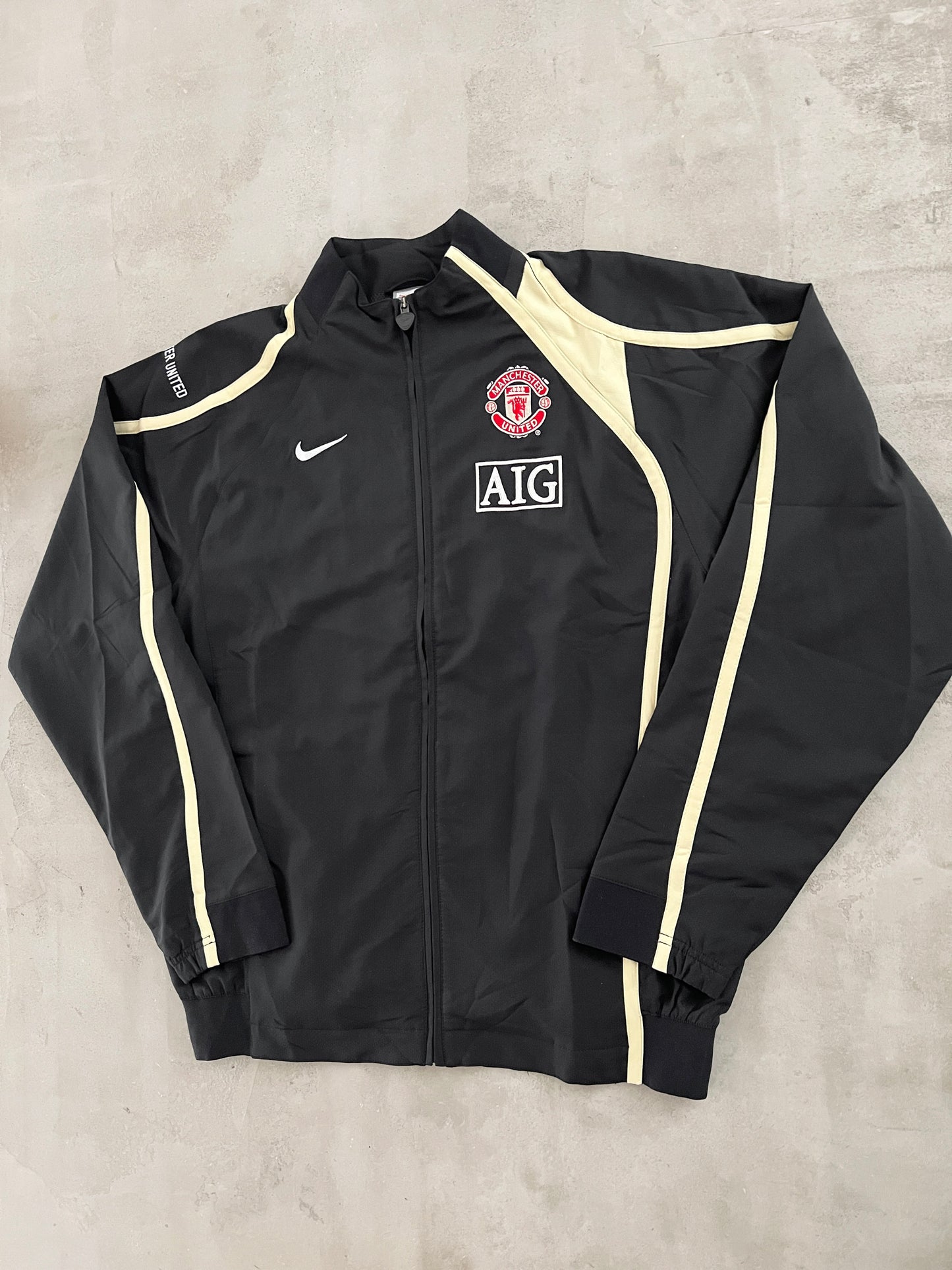 BLACK MANCHESTER UNITED NIKE JACKET - 2000S - L