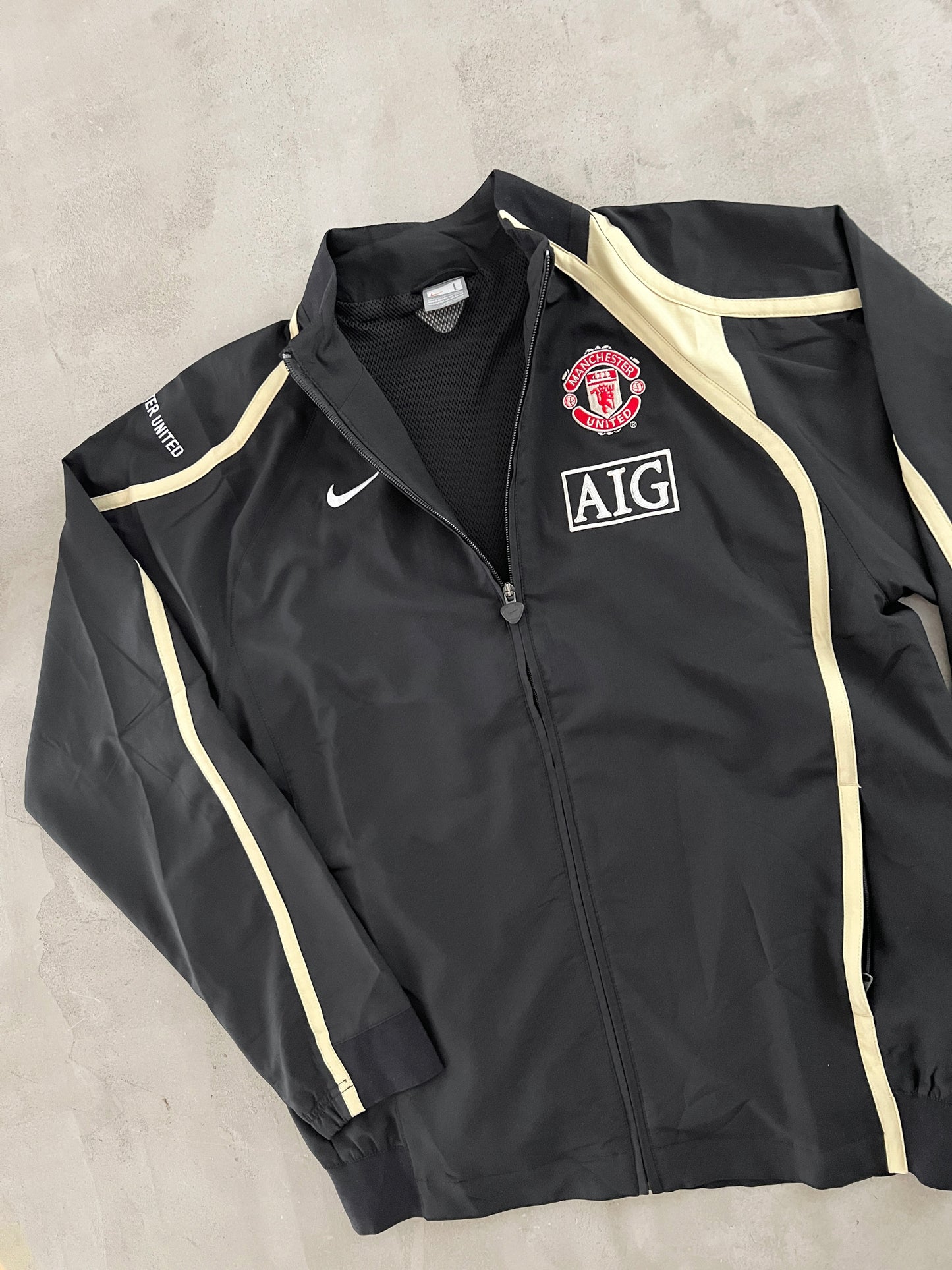 BLACK MANCHESTER UNITED NIKE JACKET - 2000S - L