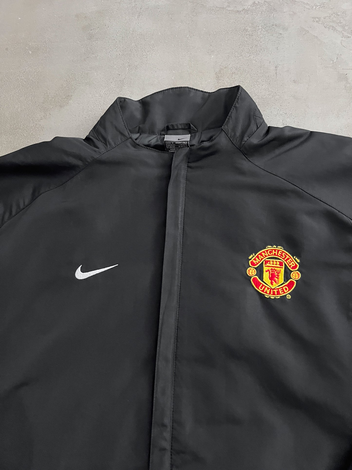 BLACK MANCHESTER UNITED NIKE JACKET - 2000S - L